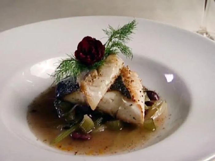 Pacific halibut with caramelized fennel, black olives, orange zest, and dill recipe