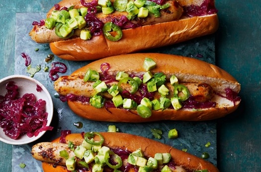Jerk hot dogs with avocado & jalapeño salsa