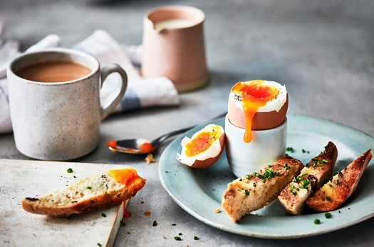 Soft egg with anchovy toasts