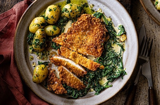 Green peppercorn chicken schnitzel with sherry-laced creamed spinach