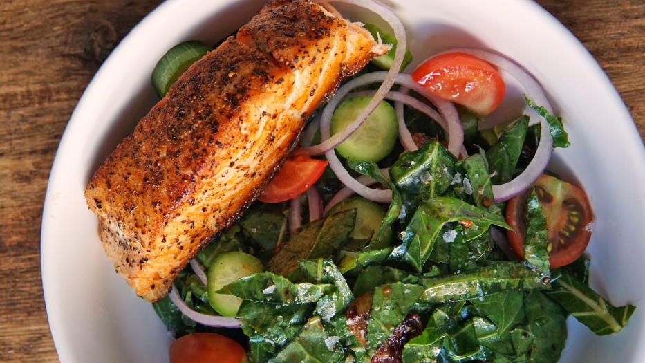 Collard salad with warm bacon dressing as made by alex hill