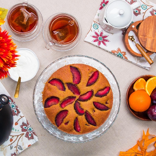 Chai-spiced plum polenta cake